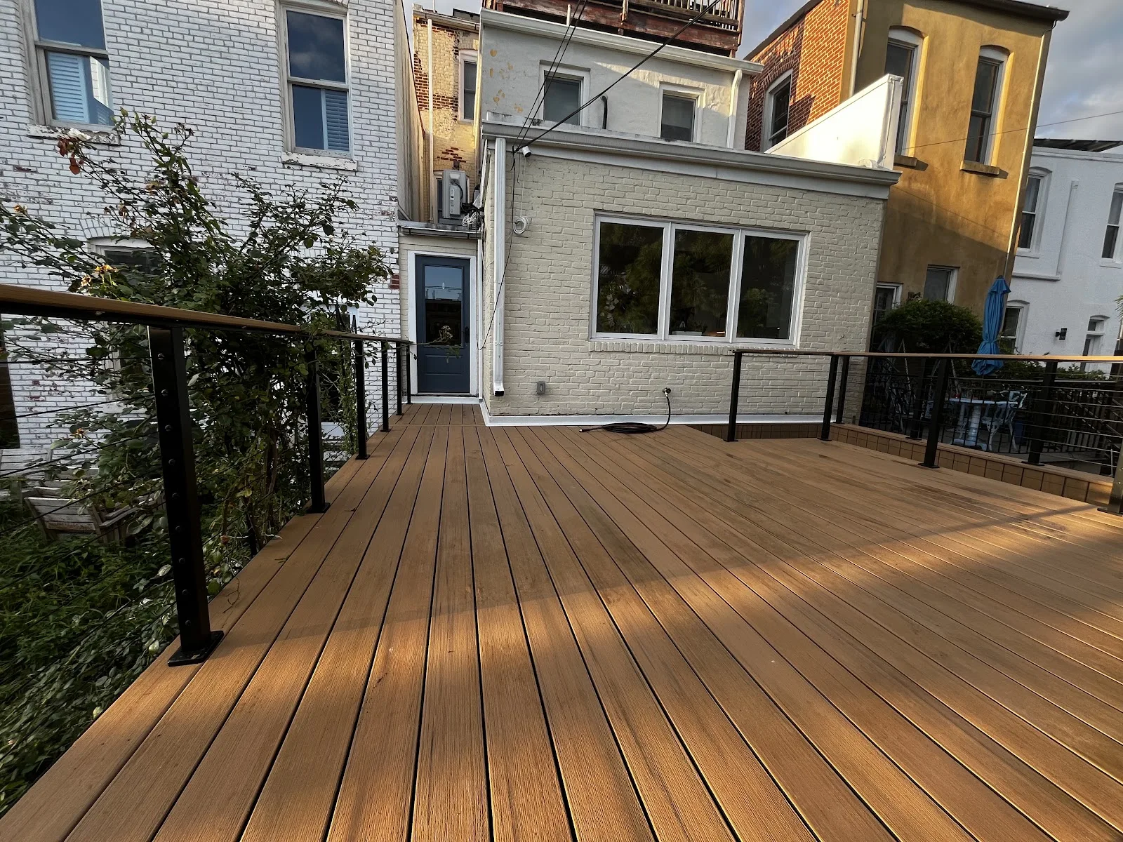 Composite deck with cable railing construction